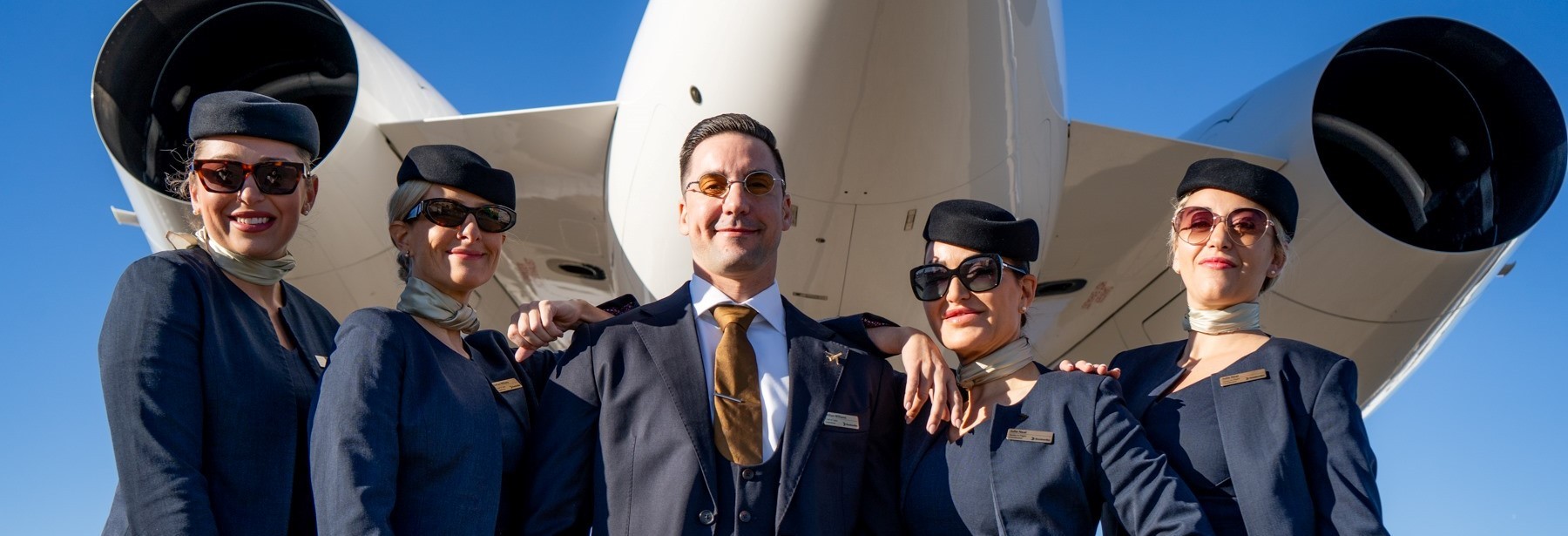 Group of flight attendants standing together